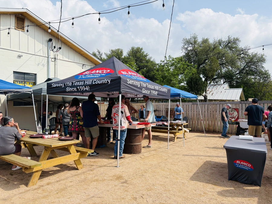 Blanco HVAC party in the outdoor space at Blanco Feed Store