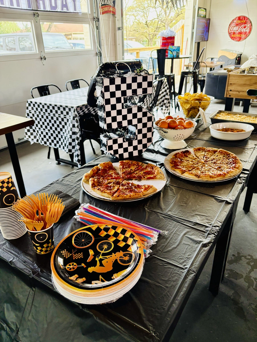 Race car themed 5 year old birthday party with pizza