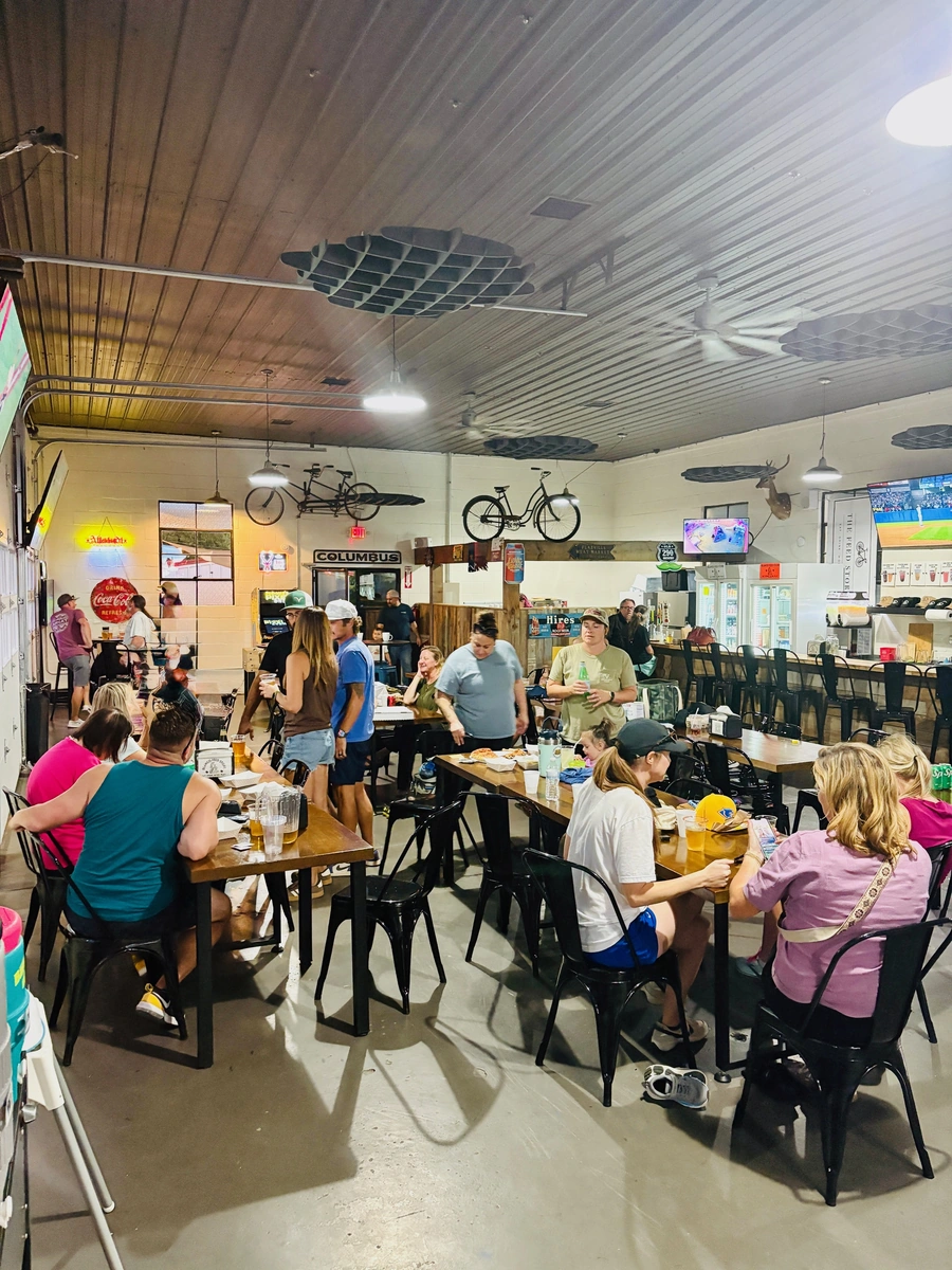 Patrons watching sports at the Blanco Feed Store