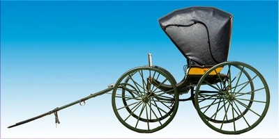 An ornate horse-drawn carriage with a black canopy top, wooden spoked wheels, and a pole for pulling the carriage.