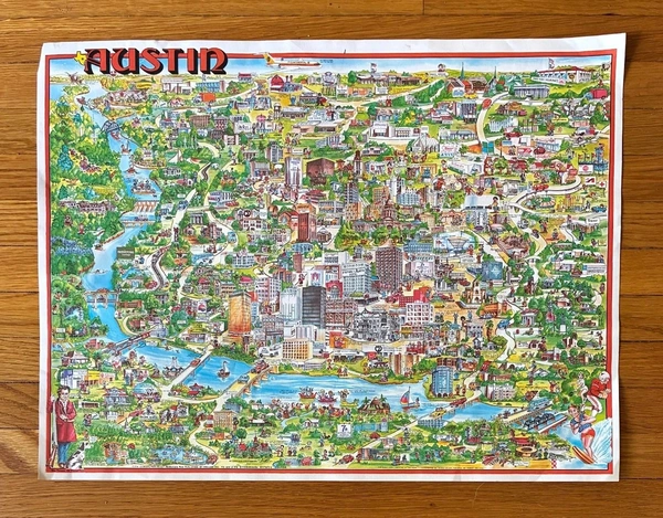 A colorful map of Austin, Texas, highlighting various landmarks and neighborhoods, likely featured in an estate sale showcasing local antiques and vintage items.