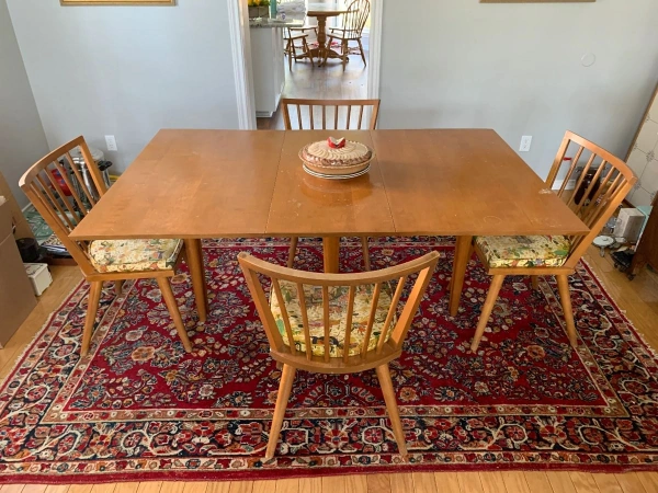Elegant dining room with wooden table and chandelier