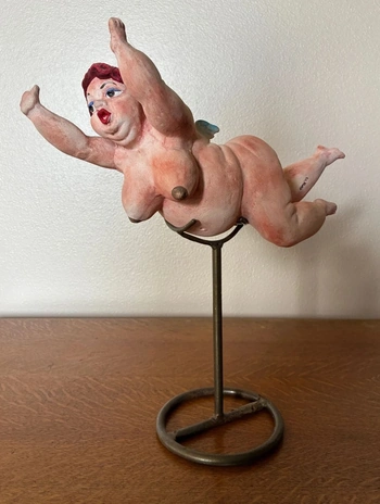 Flying nude woman stature item from estate sale