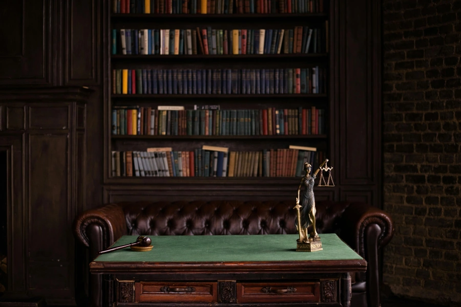 Classic law office setting with leather chair and comprehensive law library
