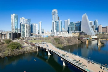 Aerial view of downtown Austin and Lady Bird Lake during the day time