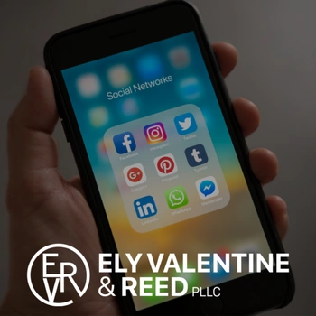 Cell phone with Ely Valentine and Reed logo