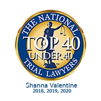 A round image badge with the text "The National Trial Lawyers Top 40 Under 40" and the name "Shanna Valentine" below it. The badge has a blue and gold color scheme.