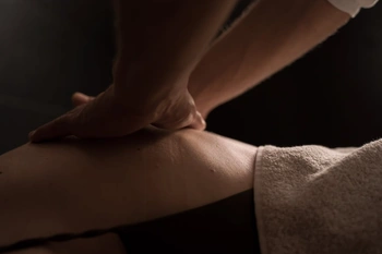 Person massaging another's back