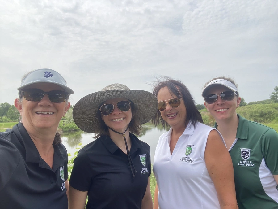 Maverick Law Group team members at charity golf event