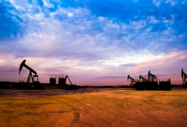 North Dakota oil field at sunset