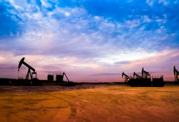 North Dakota oil field at sunset