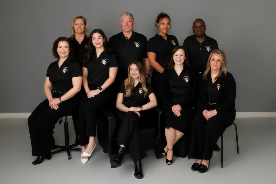 Maverick Law Group attorneys and staff posing together for a professional team portrait