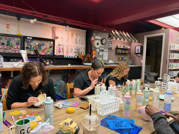 The Maverick team at a painting class