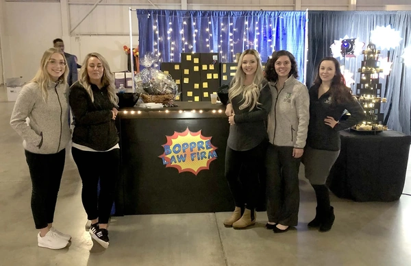 Maverick Law Group team members at a local community involvement event