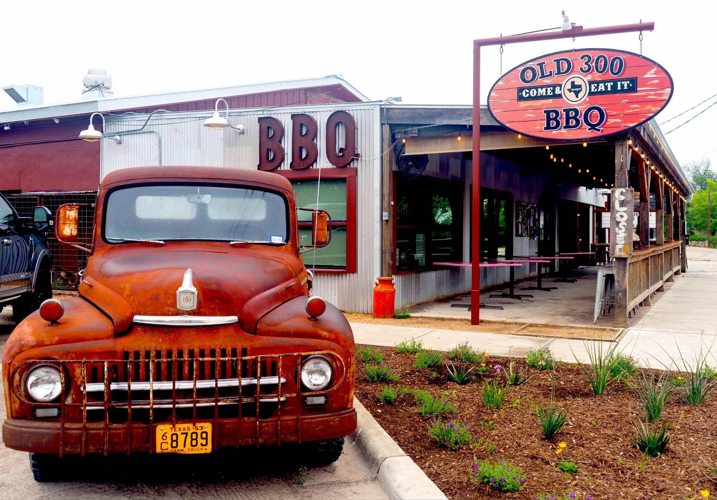 Exterior of Old 300 BBQ with antique truck