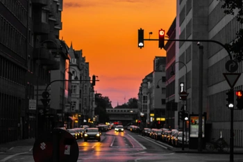 Sunset down a city road