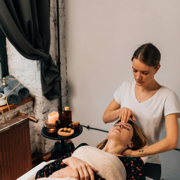Woman receiving somatic release treatment