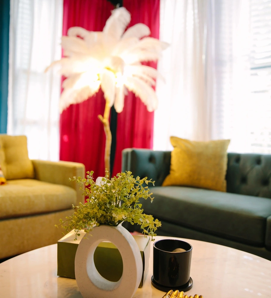 Comfortable, colorful therapy room with lots of color and a palm tree light