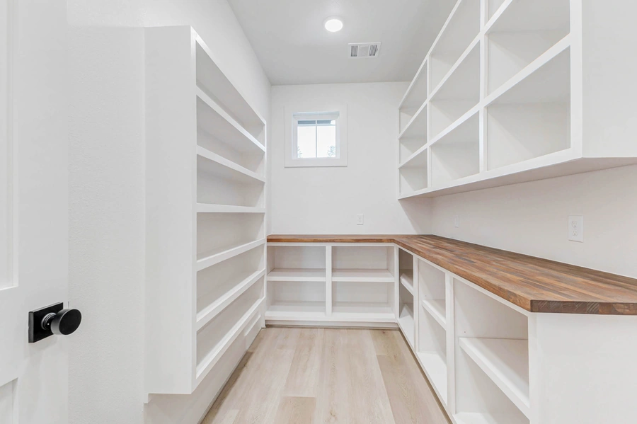 A Secondary Bedroom Closet of Garret Circle Custom Home in Bellville TX
