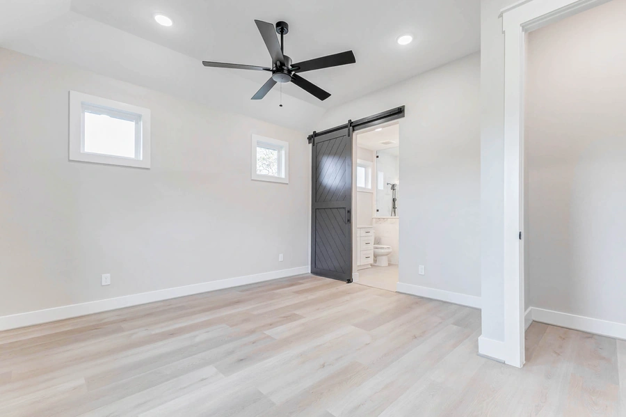 A secondary bedroom of  Garret Circle Custom Home in Bellville TX
