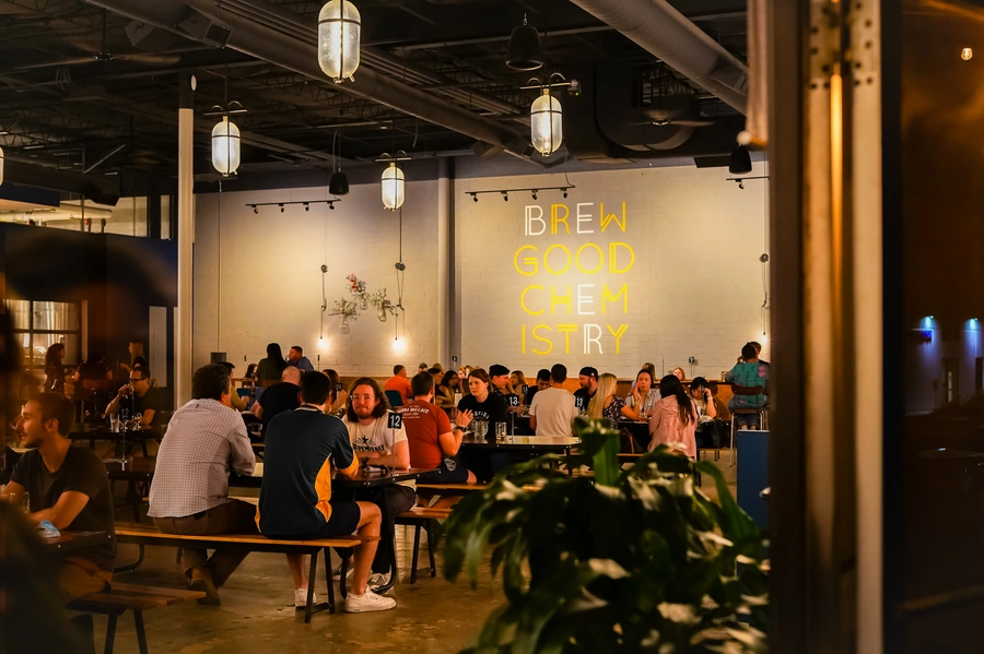 Patrons eating and drinking inside the Brewtorium