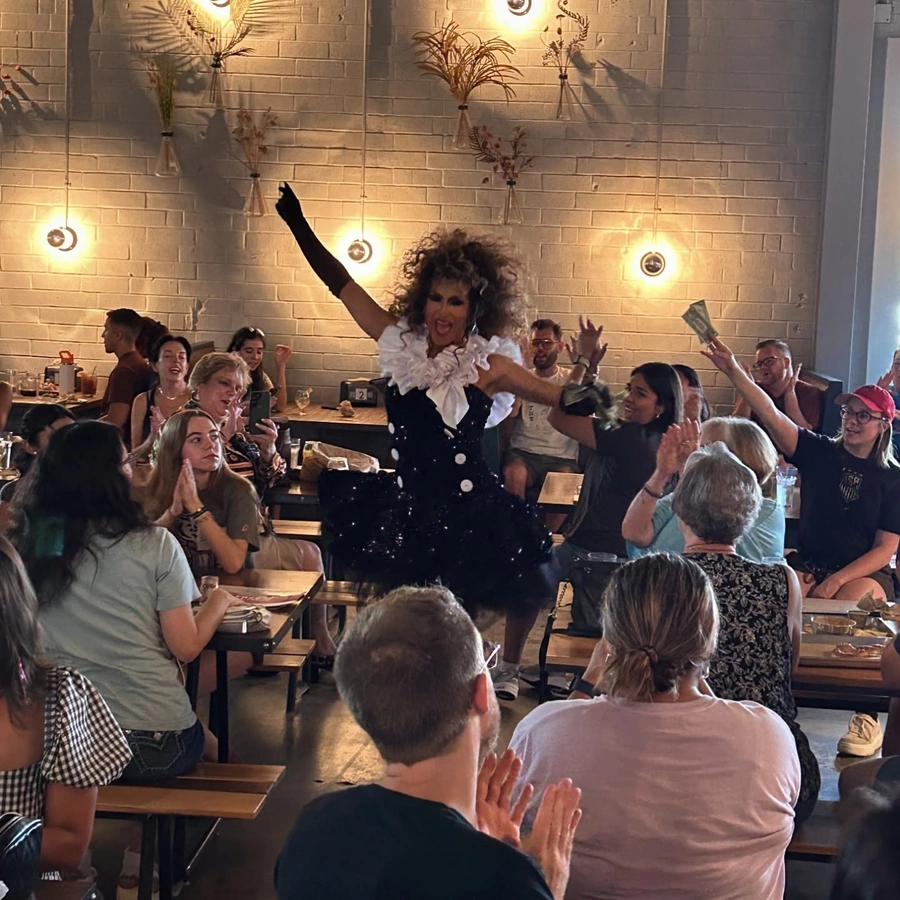 Vibrant drag show performance at Brewtorium, featuring talented performers and an enthusiastic audience in our event space