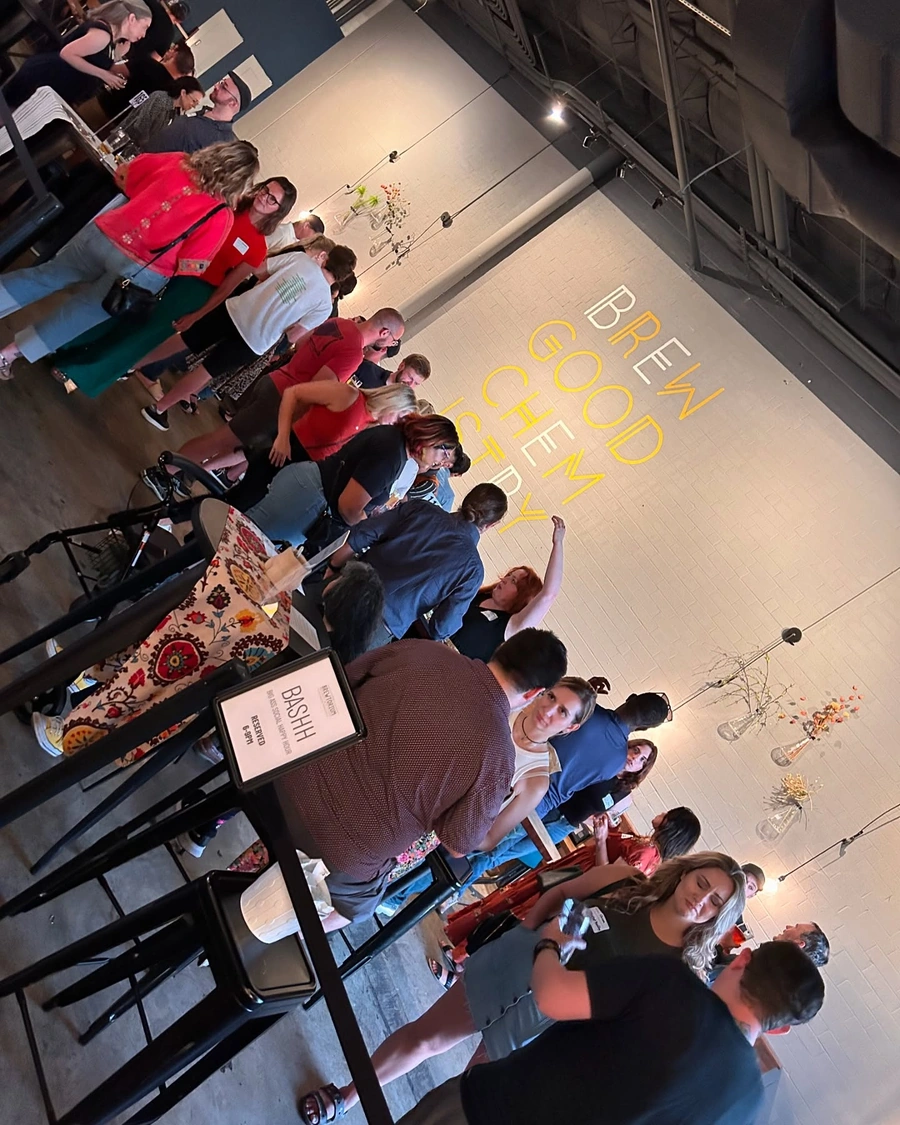 Expansive Brewtorium event space with high ceilings, ample natural light, and a modern industrial design ideal for large gatherings