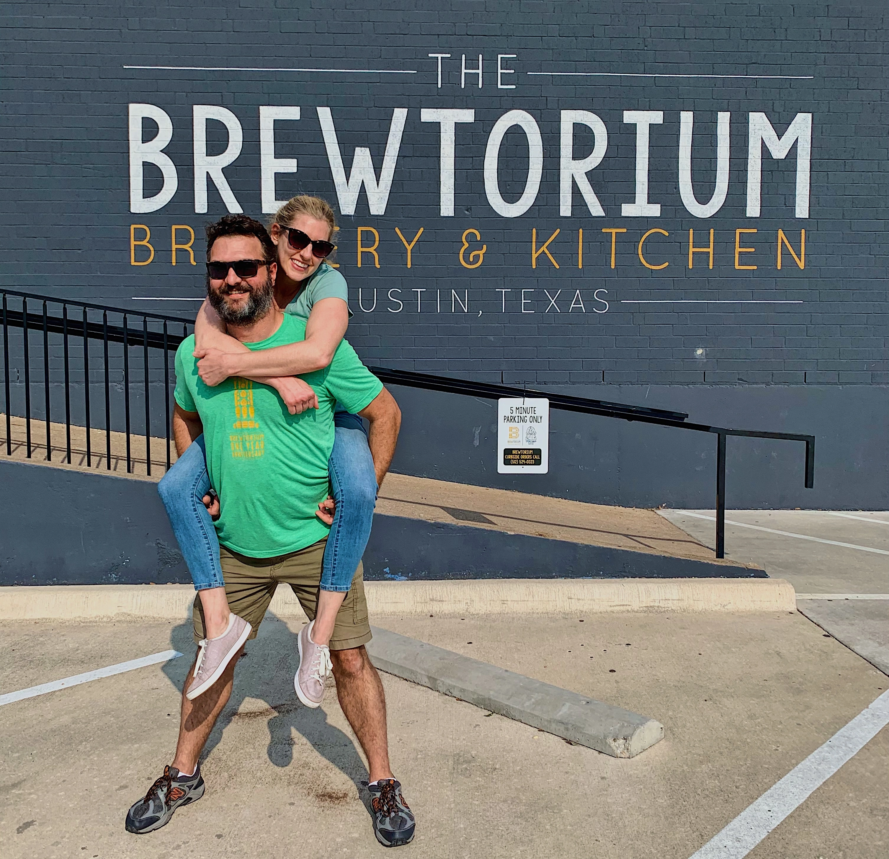 Brewtorium owners and team members gathered in the brewery, showcasing the friendly and passionate staff behind Austin's premier craft beer destination