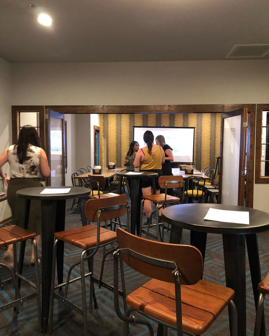 Elegant private event space at Brewtorium with modern decor, flexible seating arrangements, and a sophisticated ambiance for special occasions