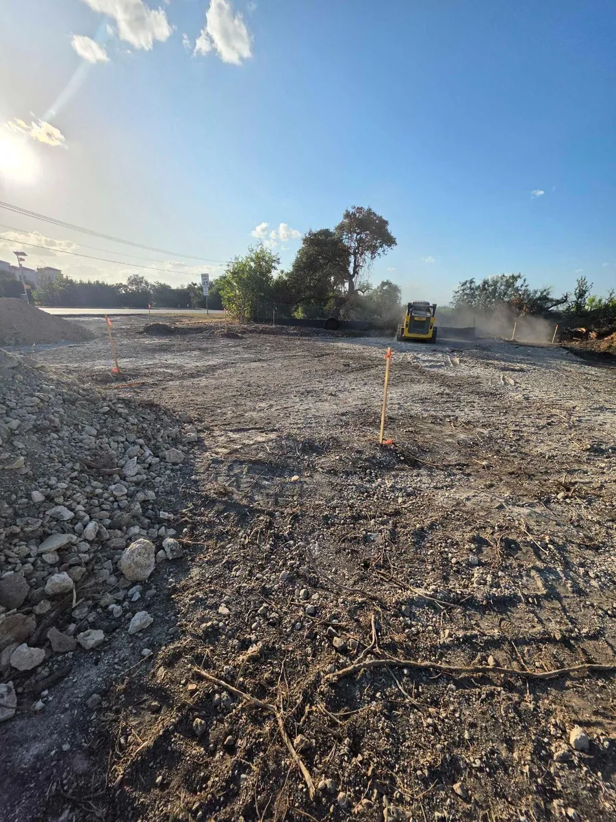 Wide view of site grading and earthwork at the Bagdad Road retail site