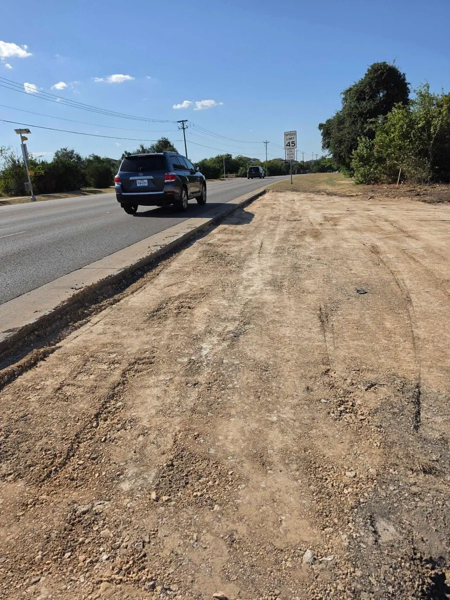 Graded strip along Bagdad Road for the new turn lane