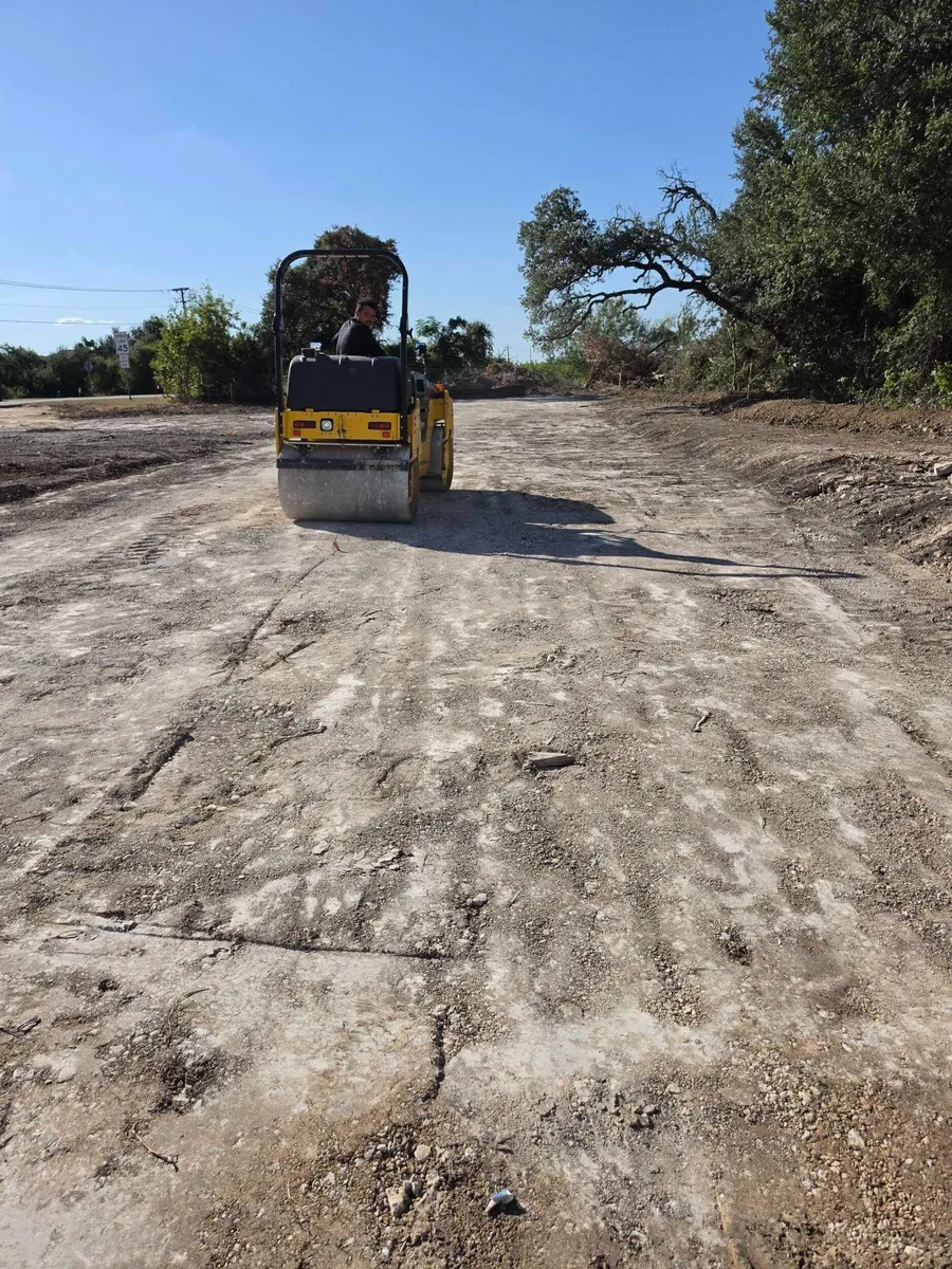 Roller compactor compacting subgrade at the Bagdad Road retail site