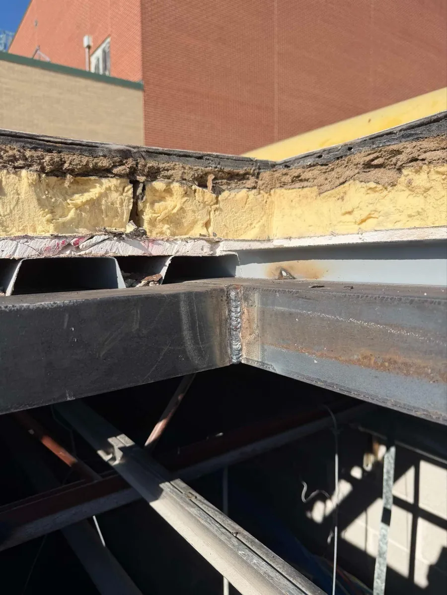 Steel framing and bracing below a skylight opening at Connally High School
