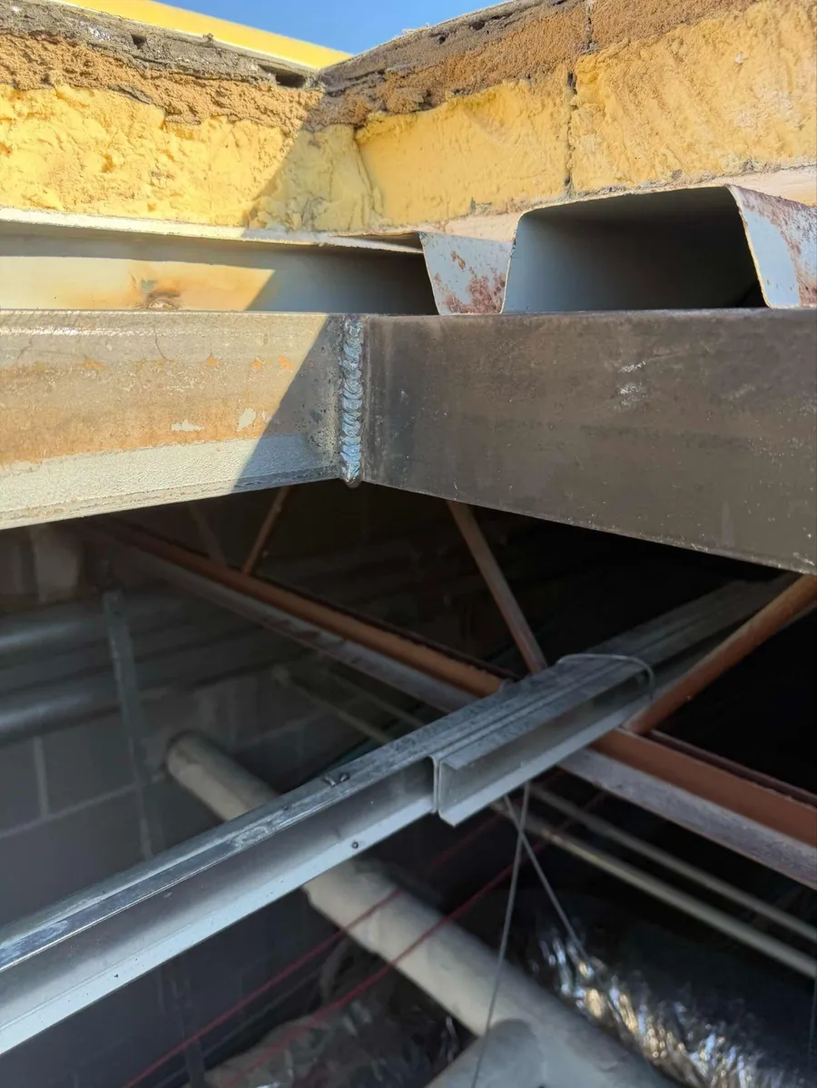 Steel angle supports and bracing for a skylight at Connally High School