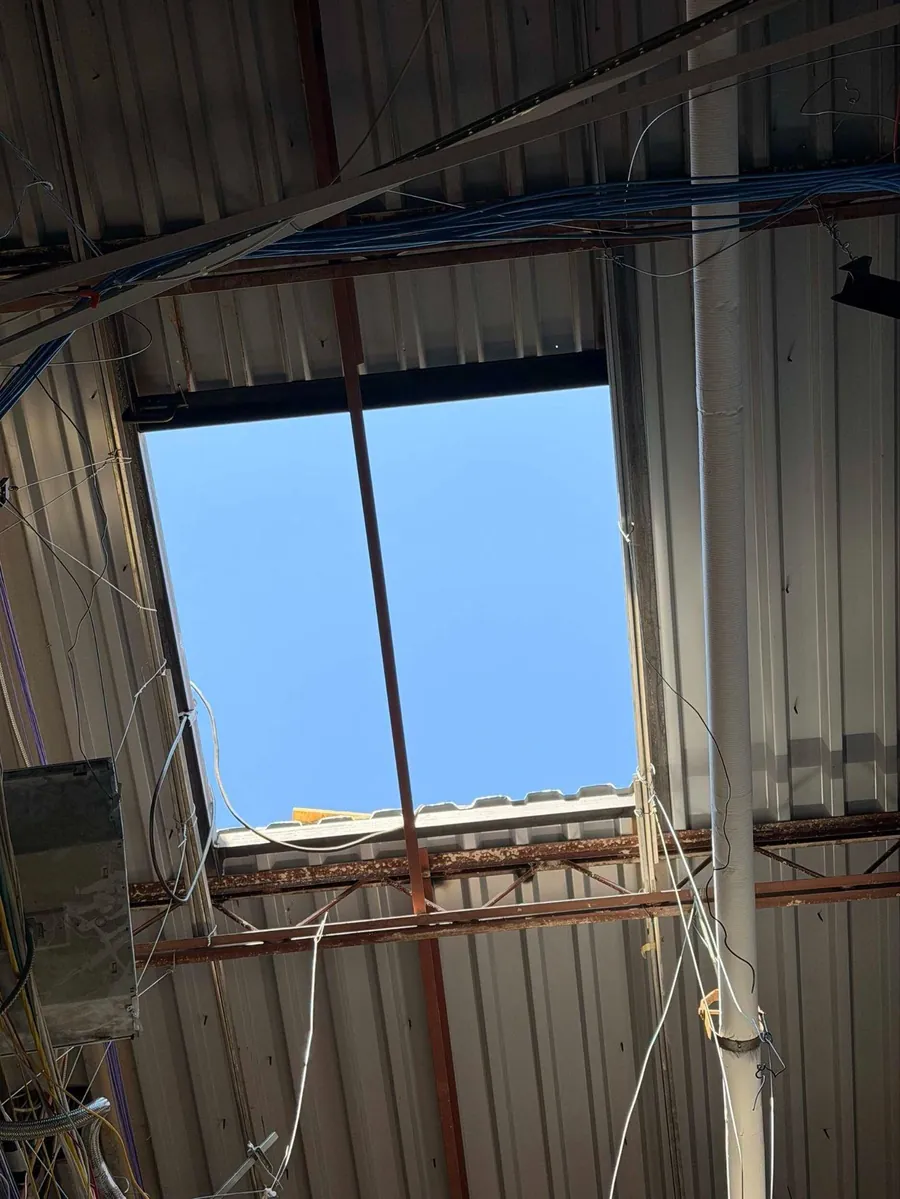 View up through a finished steel-framed skylight at Connally High School