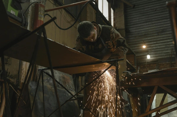 Man fabricating steel