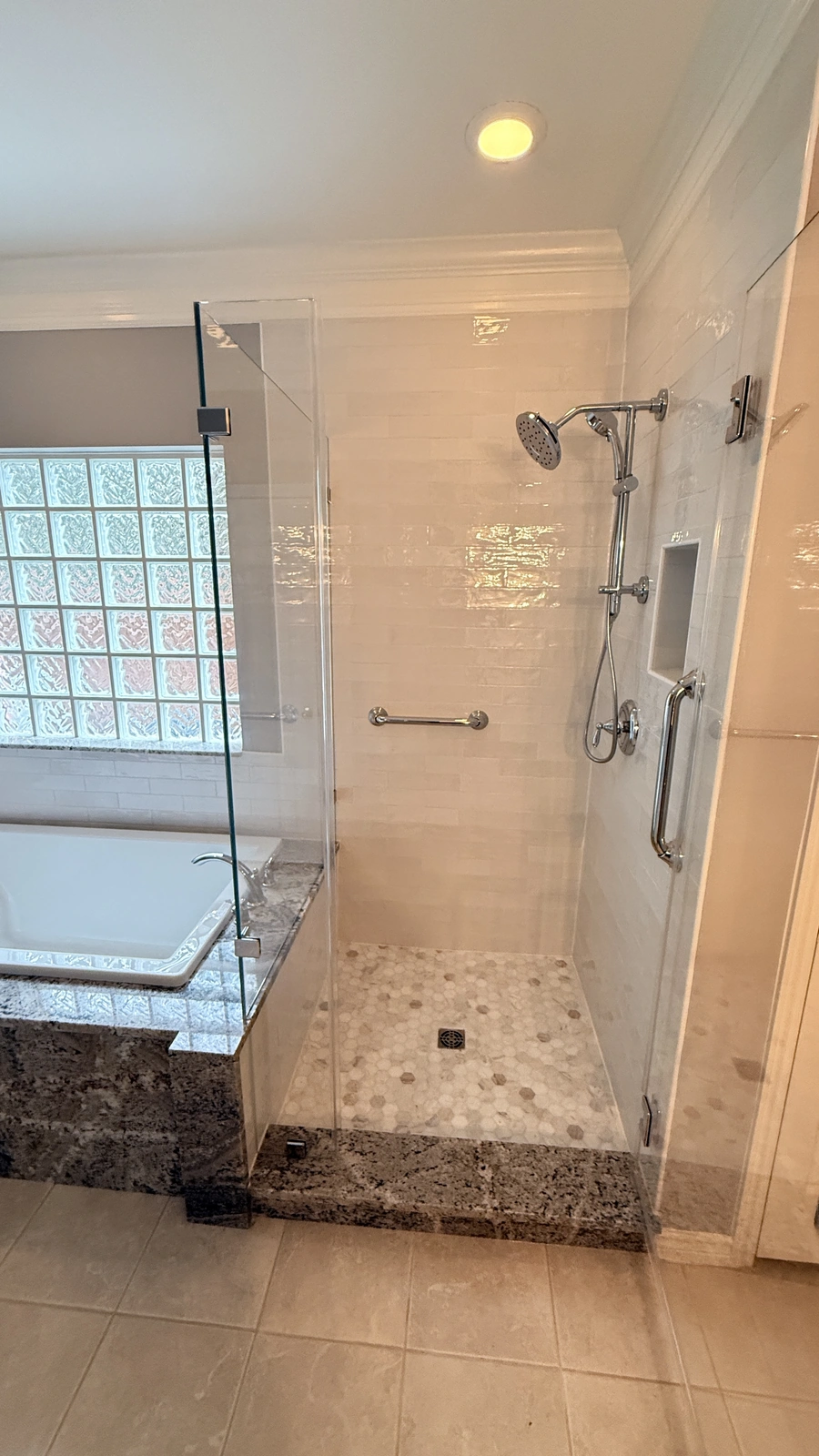 Bathroom tile  on floor, around tub, and in shower