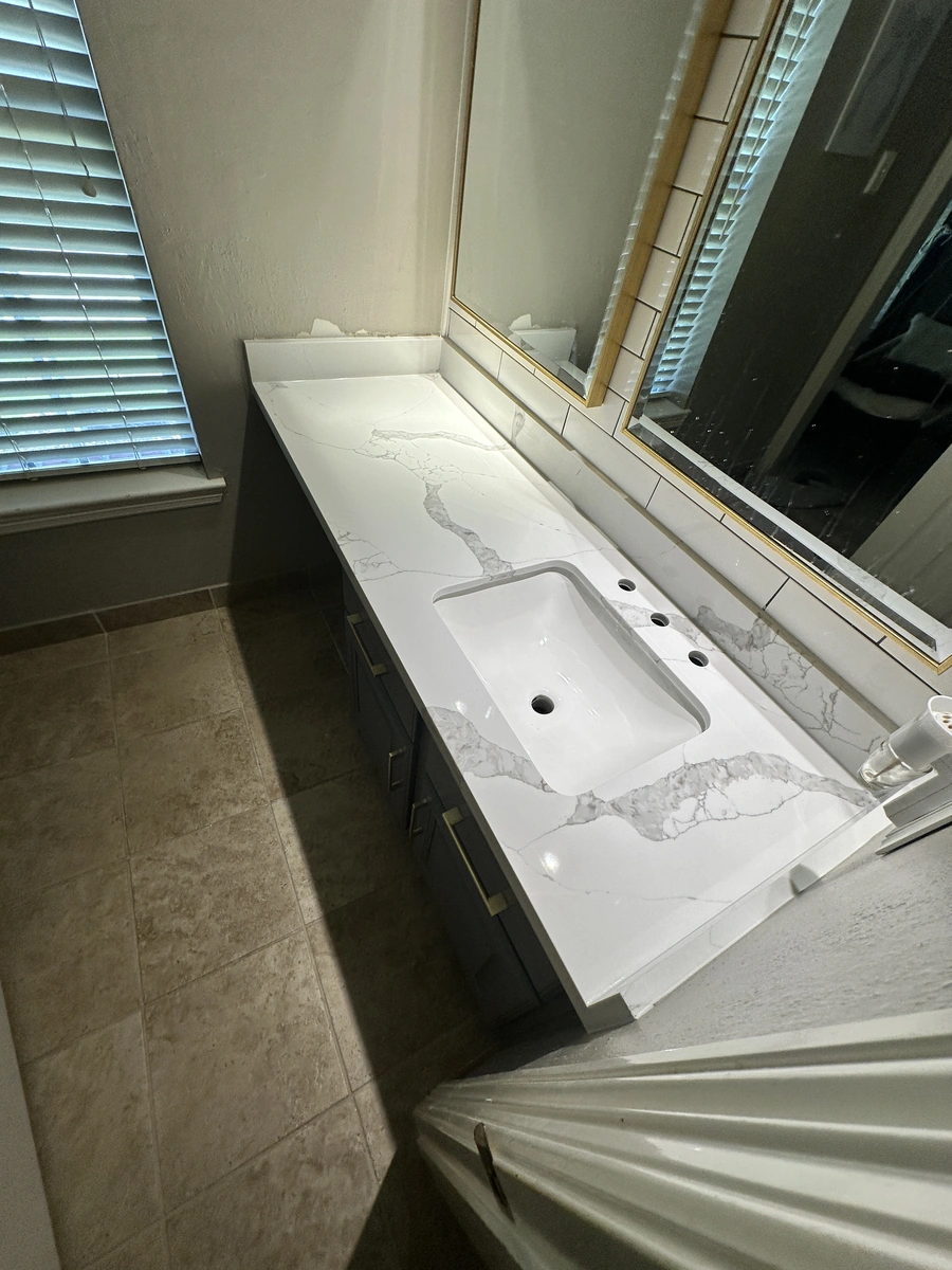 Porcelain countertop and sink in bathroom