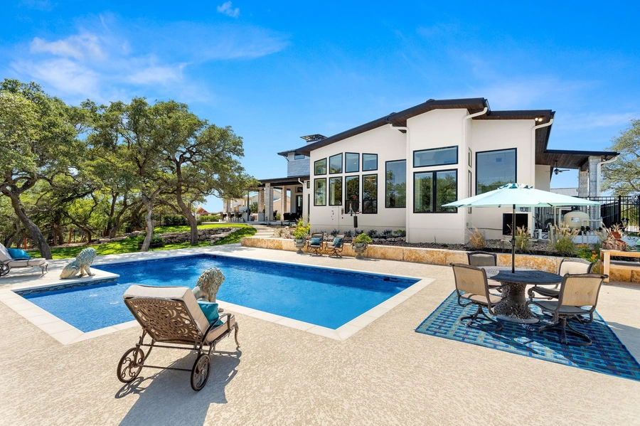 Backyard pool of home built by Vintage Luxury Builders