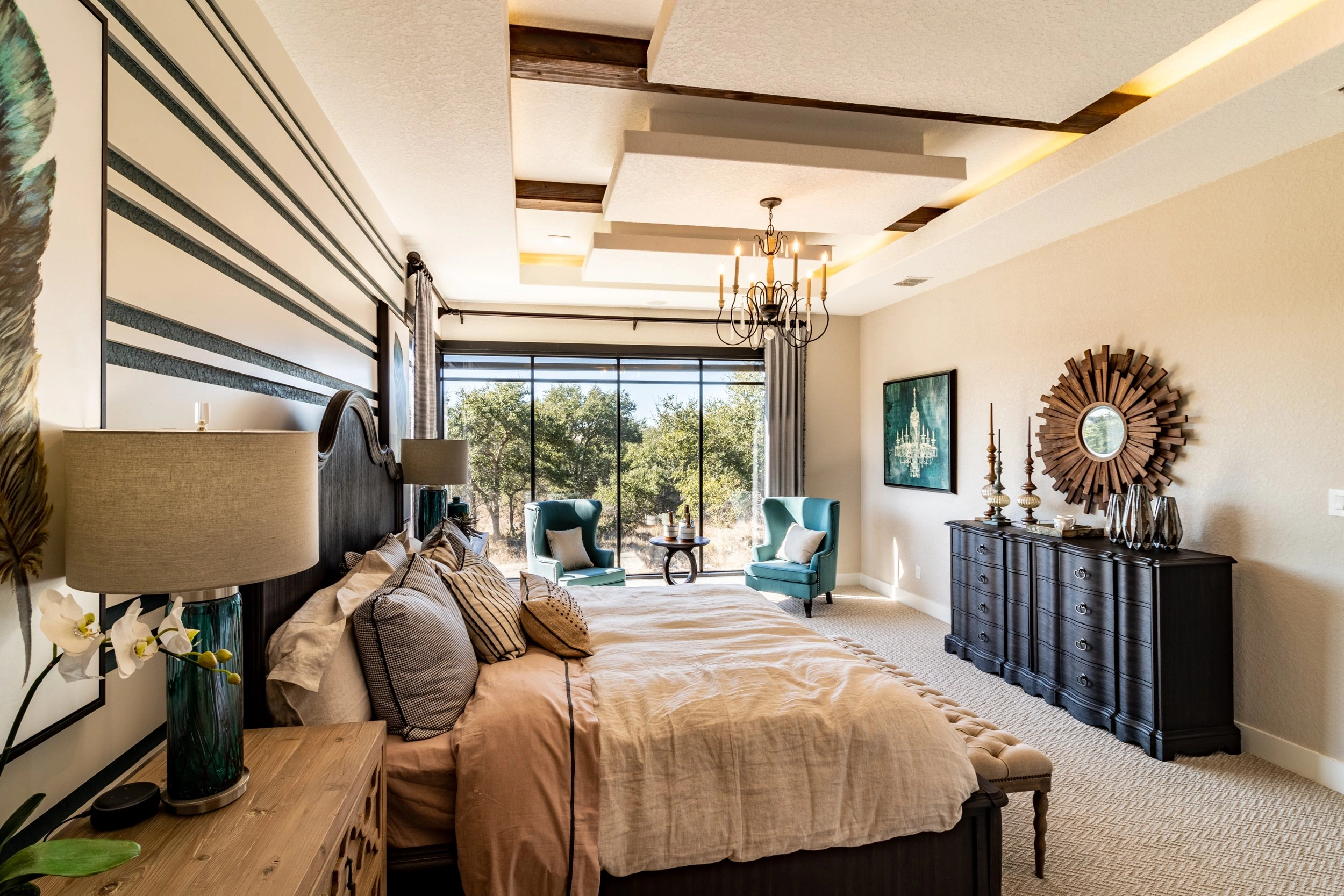 Fully furnished primary bedroom built by Vintage Luxury Builders