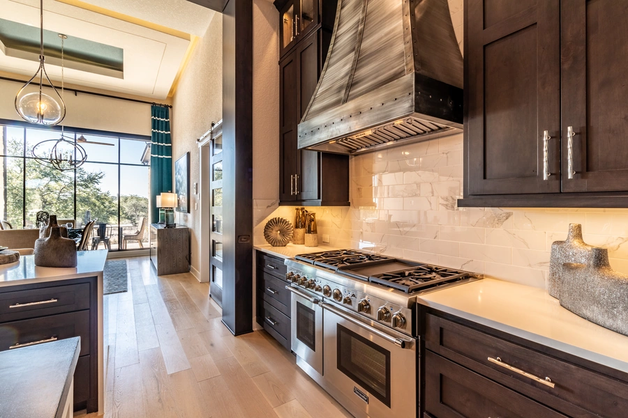 Example of a kitchen by Vintage Luxury Builders