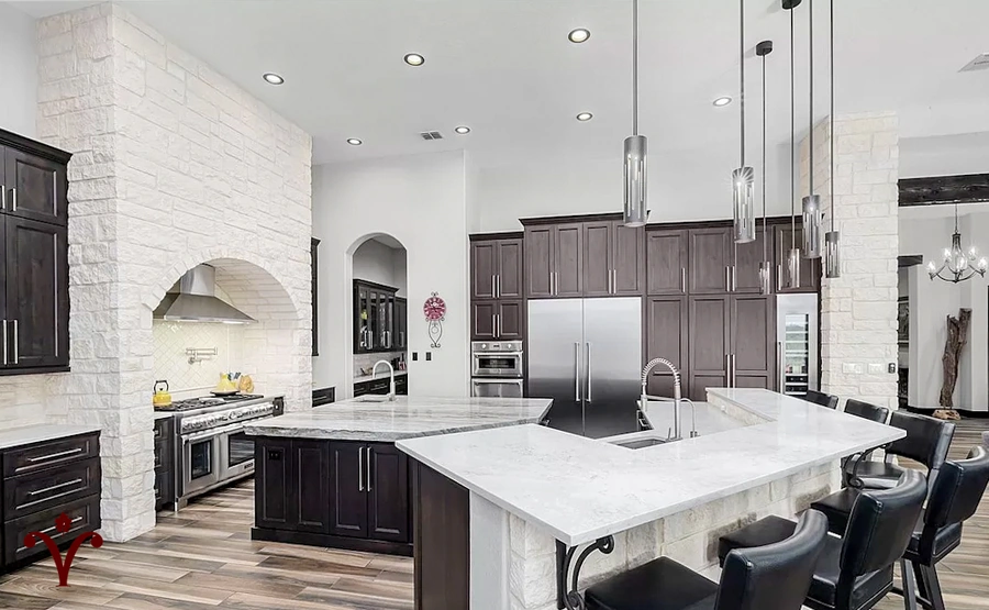 Example of a kitchen by Vintage Luxury Builders