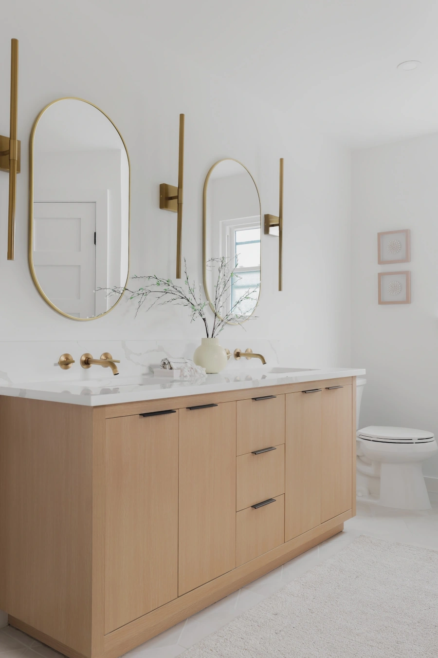 Modern bathroom vanity with oval mirror