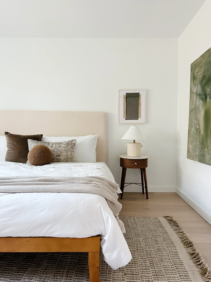 Bright bedroom with natural light and neutral tones