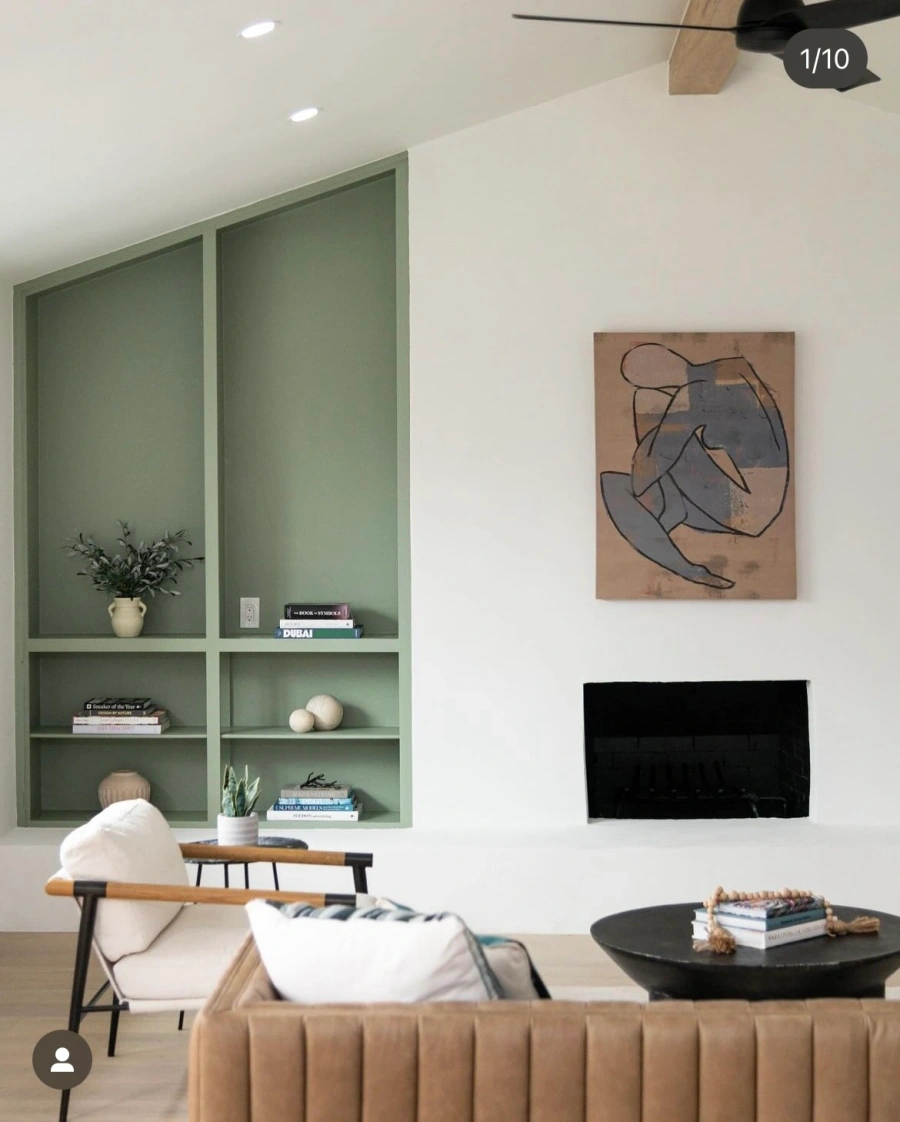 Living room with fireplace and built-in shelving