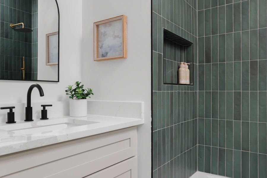 Modern bathroom with green geometric tile