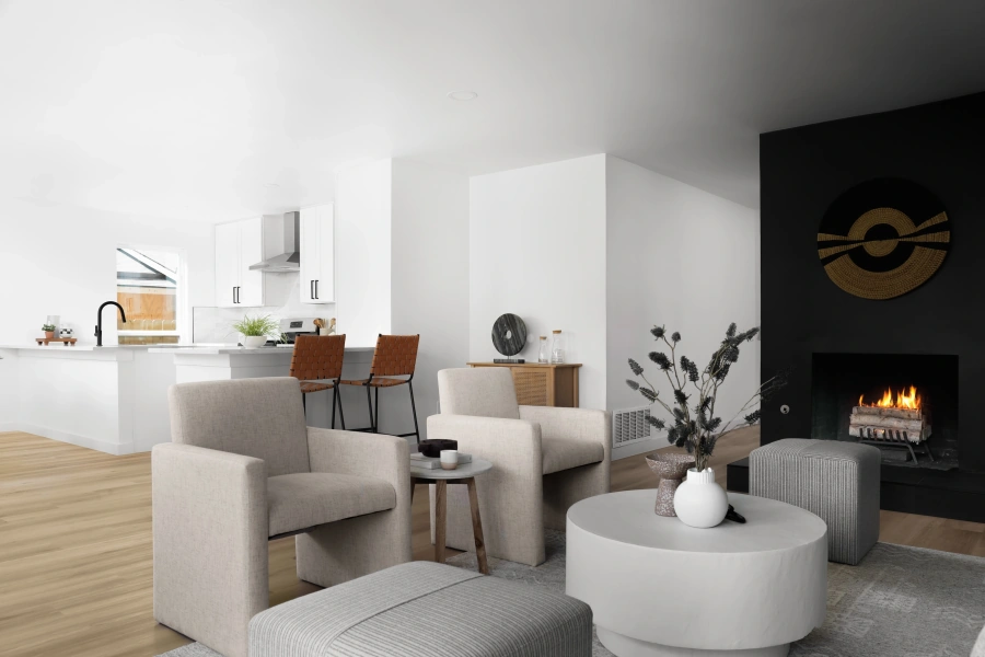 Open concept living space with modern fireplace and kitchen