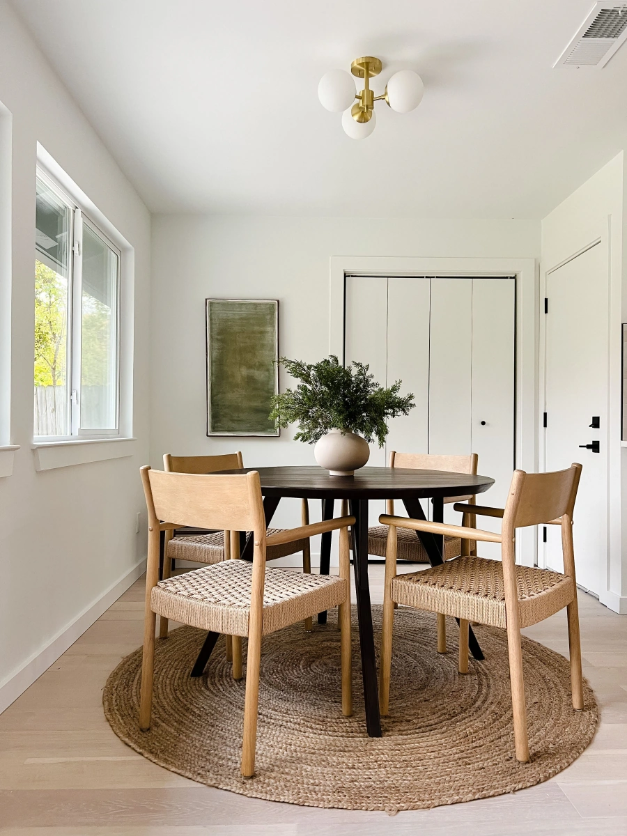 Minimalist dining area with round table
