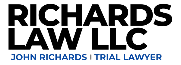 The logo for Richards Law LLC, a legal services firm led by trial lawyer John Richards. The logo features the company name in bold text with the tagline "John Richards | Trial Lawyer" below.